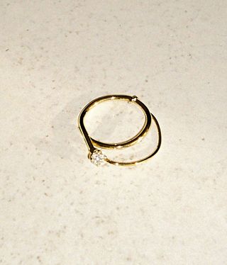 Engagement ring in gold and diamonds by Sansoeur