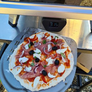 Pizza before cooking in the Ooni Karu 16 Multi-Fuel Pizza Oven