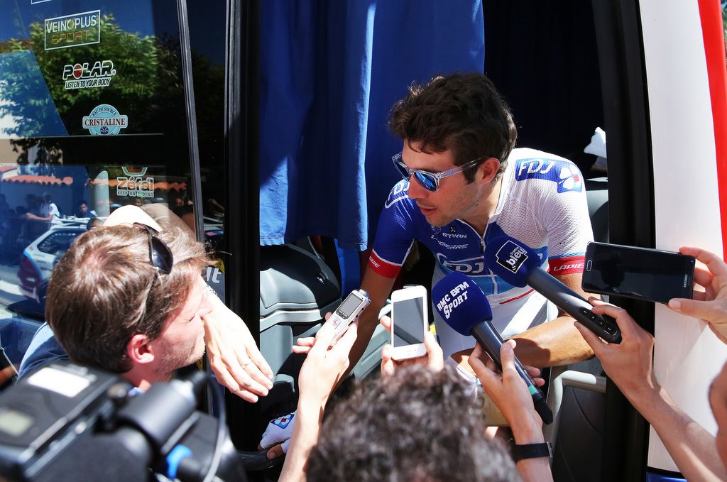 Thibaut Pinot (FDJ) speaks with the press after the stage from the team bus