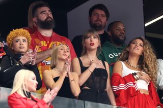 Rapper Ice Spice, NFL player Jason Kelce, singer Taylor Swift and actress Blake Lively react prior to Super Bowl LVIII.