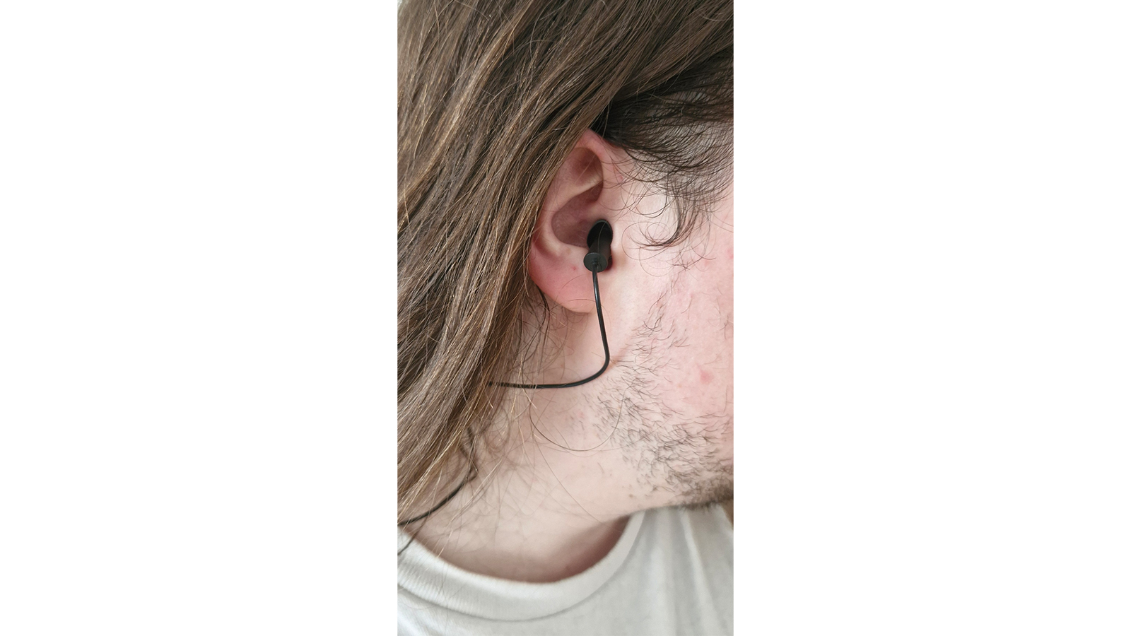 Fender Musician earplugs in a man's ear