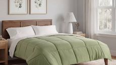 A modern bedroom with green quilted bedsheets from Kohl's. 