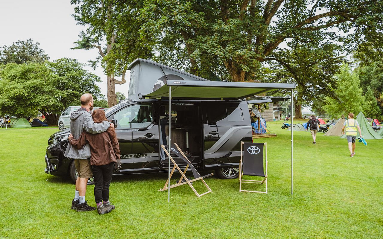 A couple enjoying a Toyota Proace Matino 3 campervan