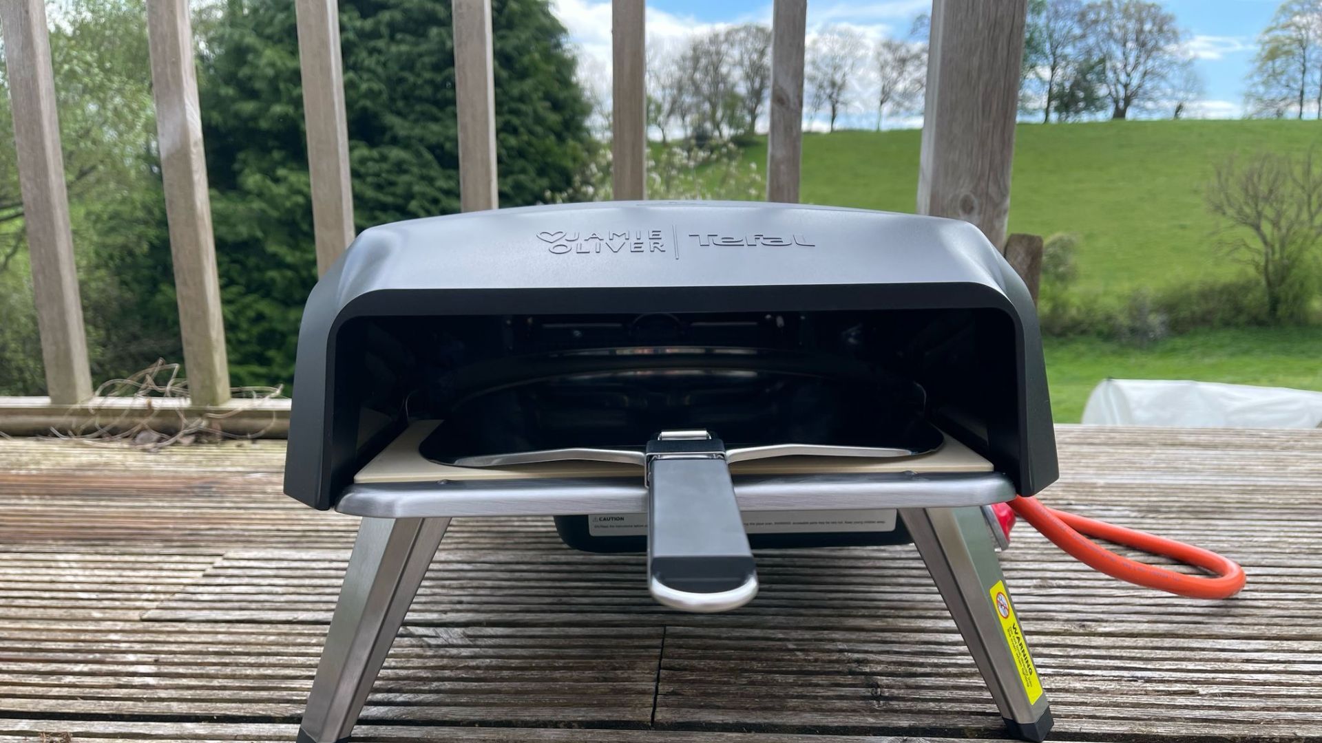 Tefal Jamie Oliver by Tefal JM4168G1 Stone-bake Pizza Oven on the deck