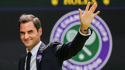 Roger Federer greets the audience at Wimbledon 2022