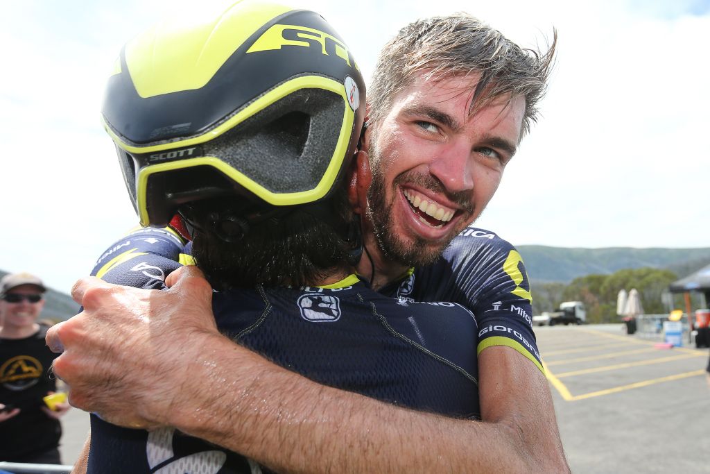 Esteban Chaves congratulates teammate Damien Howson on his win