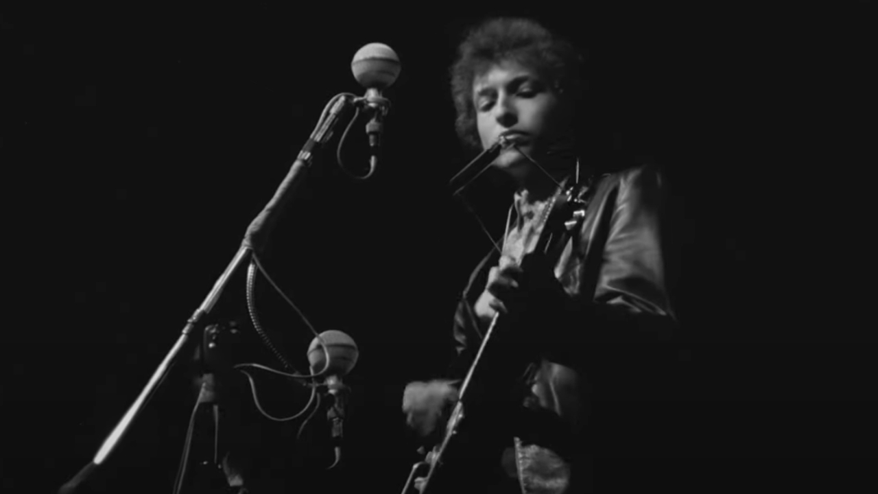 Bob Dylan performing at the Newport Folk Festival in 1965