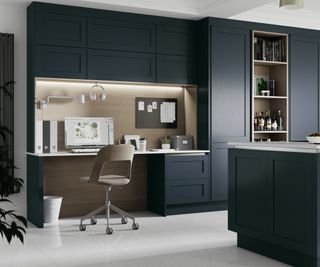 home office space integrated into navy kitchen units