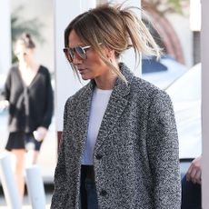 Jennifer Lopez wears a gray coat