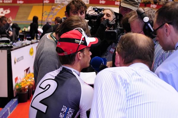 Keisse is mobbed by the local news