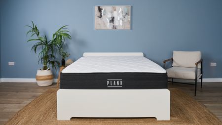 The Plank Firm Luxe mattress in the Tom;s Guide Sleep Lab, dressed to look like a bedroom