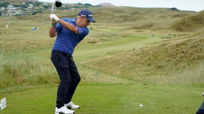 Paul McGinley hits a golf shot