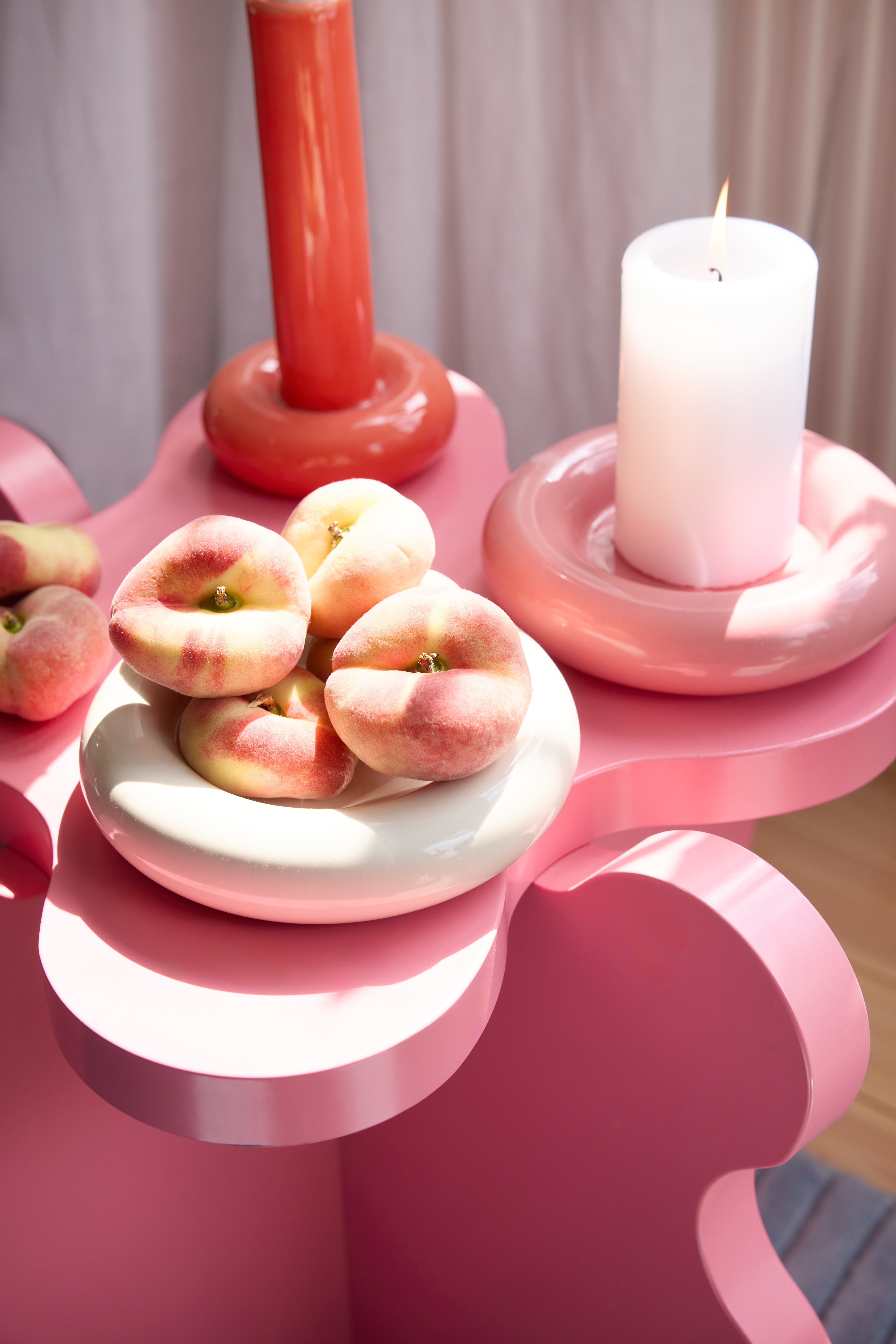 A series of whimsically shaped, pastel-shaded objects with a chunky feel sits in a Scandinavian studio flat with an irreverent atmosphere.
