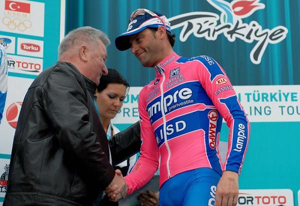 Stage winner Alessandro Petacchi (Lampre-ISD) is congratulated on the podium.