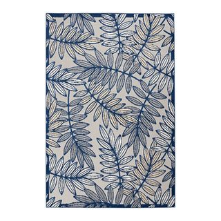 blue leaf print rug with grey background 