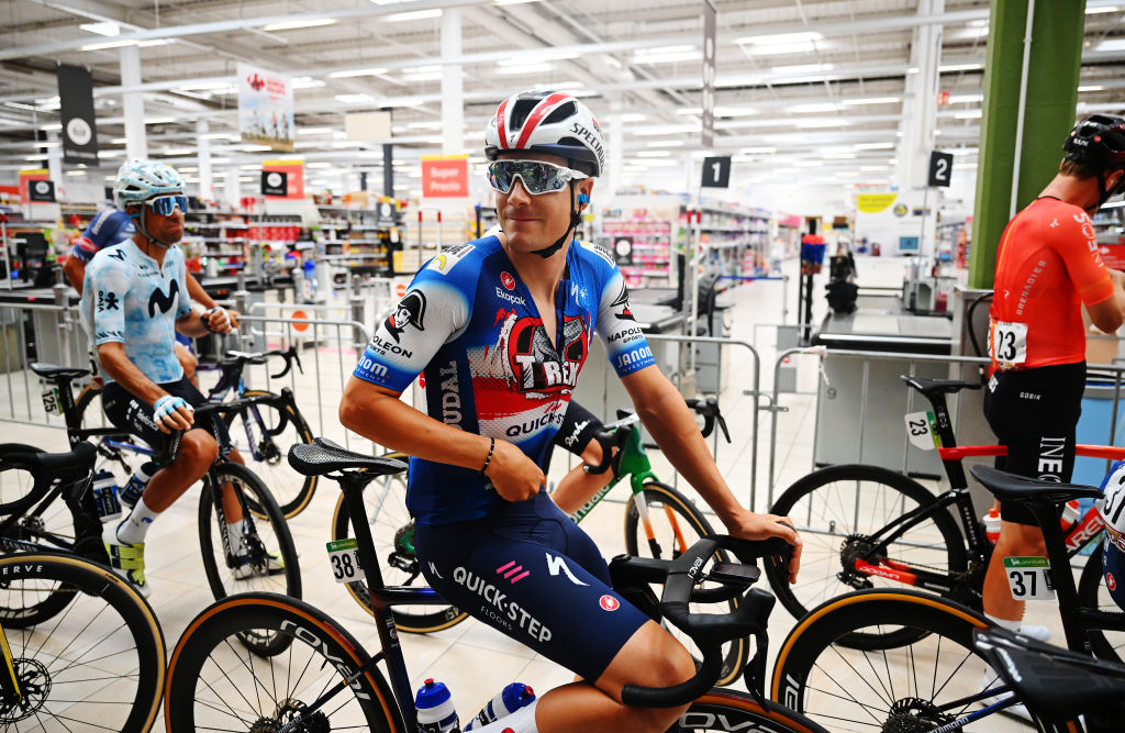 JEREZ DE LA FRONTERA SPAIN  AUGUST 22 LR Louis Vervaeke of Belgium and Team TRex Quick Step at the start of race inside a shopping mall prior to the La Vuelta  79th Tour of Spain 2024 Stage 6 a 1855km stage from Jerez de la Frontera to Yunquera  UCIWT  on August 22 2024 in Jerez de la Frontera Spain Photo by Dario BelingheriGetty Images