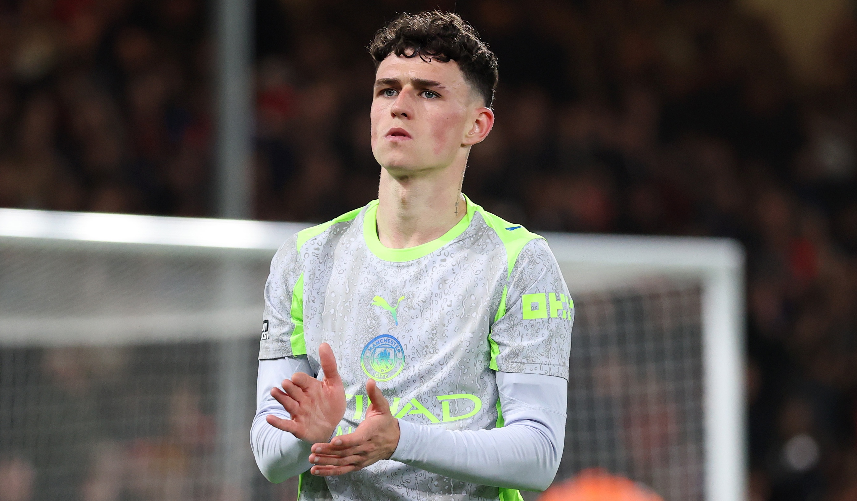 Phil Foden of Manchester City acknowledges the fans following the team's 1-1 draw in the Premier League match between Bournemouth and Manchester City at Vitality Stadium