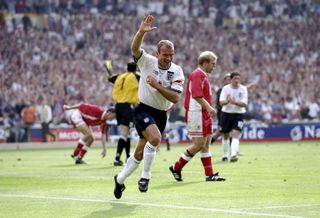 Alan Shearer celebrates after scoring his third goal for England against Luxembourg in September 1999.