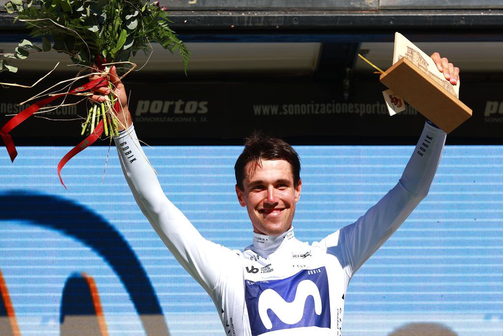 POZA DE LA SAL SPAIN AUGUST 16 Oier Lazkano Lopez of Spain and Movistar Team celebrates at podium as White best young jersey winner during the 45th Vuelta a Burgos 2023 Stage 2 a 131km team time trial from Oa to Poza de la Sal on August 16 2023 in Poza de la Sal Spain Photo by Gonzalo Arroyo MorenoGetty Images