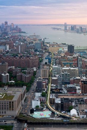 aerial view is taken from the vantage of West 30th Street, looking south toward the Statue of Liberty and the World Trade Center site