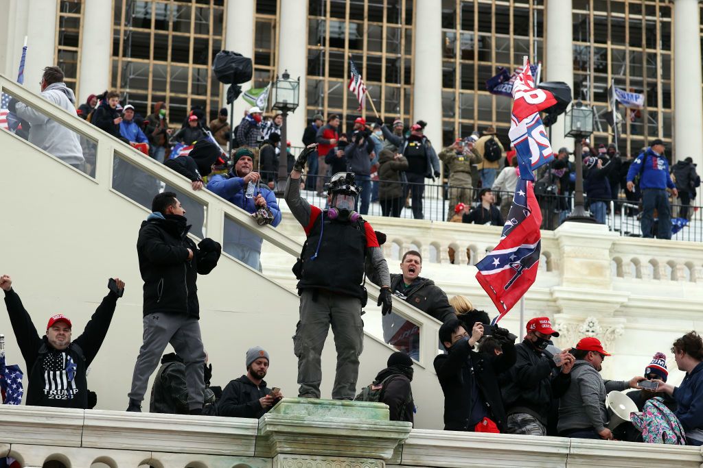 Trump supporters attacking the Capitol.