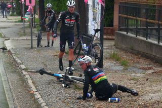 Evenepoel on the ground after his first crash of the stage