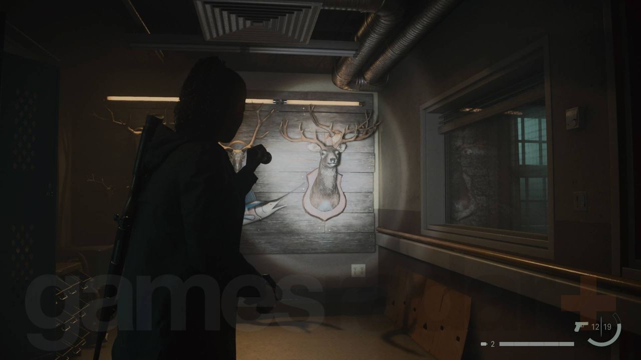 Alan Wake 2 deer head in wellness center workshop