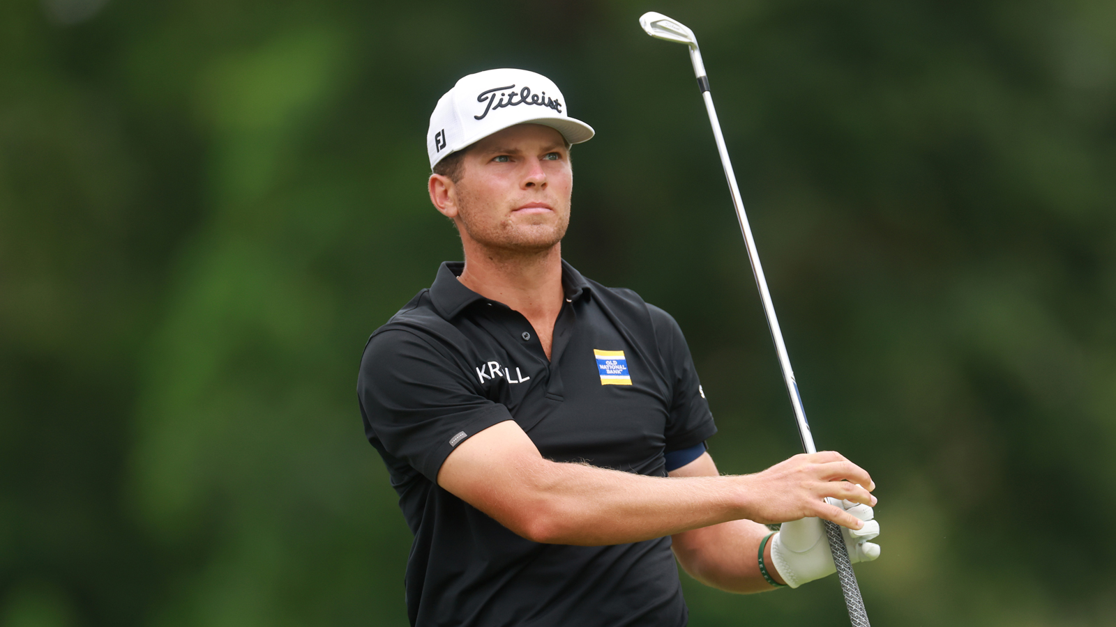 Michael Brennan hits an iron shot