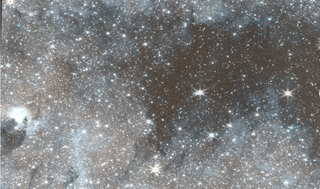 A starry section of space with gaseous patterns in the background.