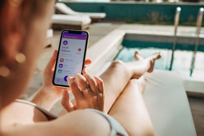 lady using banking app on her phone