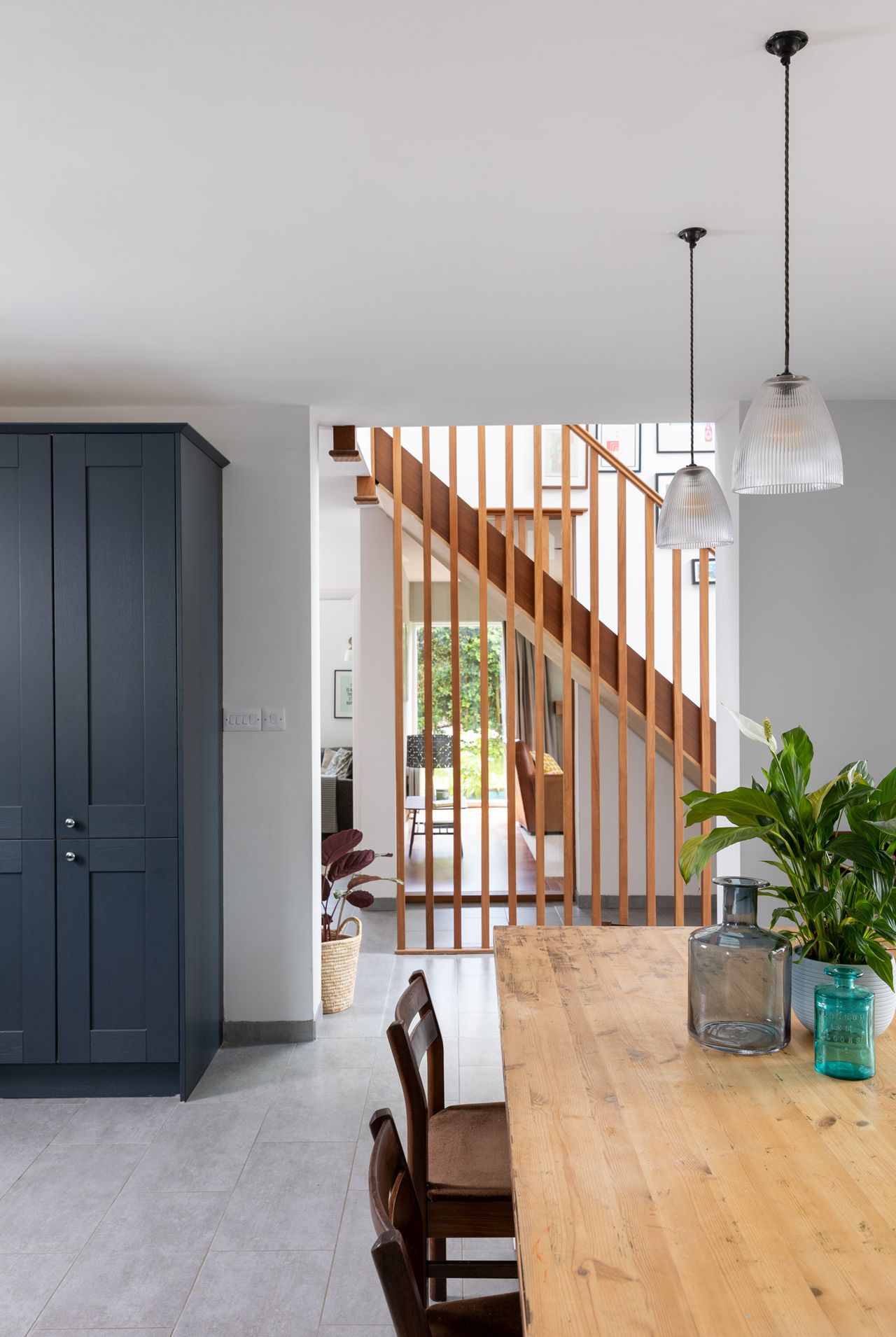 Introducing natural light was critical, so internal glazing allows a through-view behind the sapele staircase into the living room.