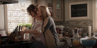 Station 19 Corina DeLuca Maya Bishop hugging and cooking