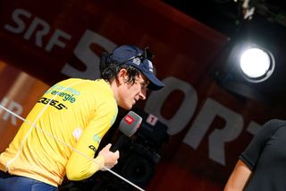 Geraint Thomas speaks to the press after winning the Tour de Suisse