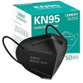 Black KN95 protectice mask with green and white cardboard box