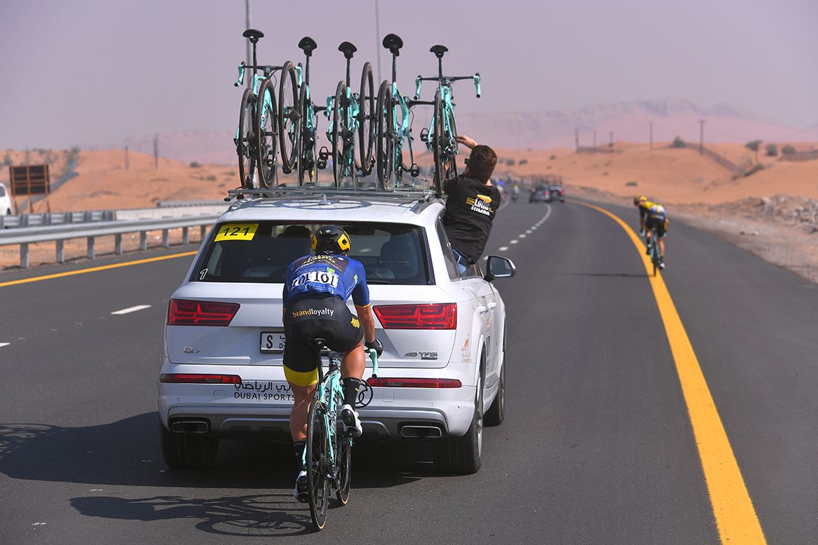 Dylan Groenewegen gets paced back up to the peloton