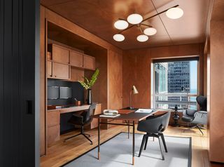 a paneled office with hidden storage