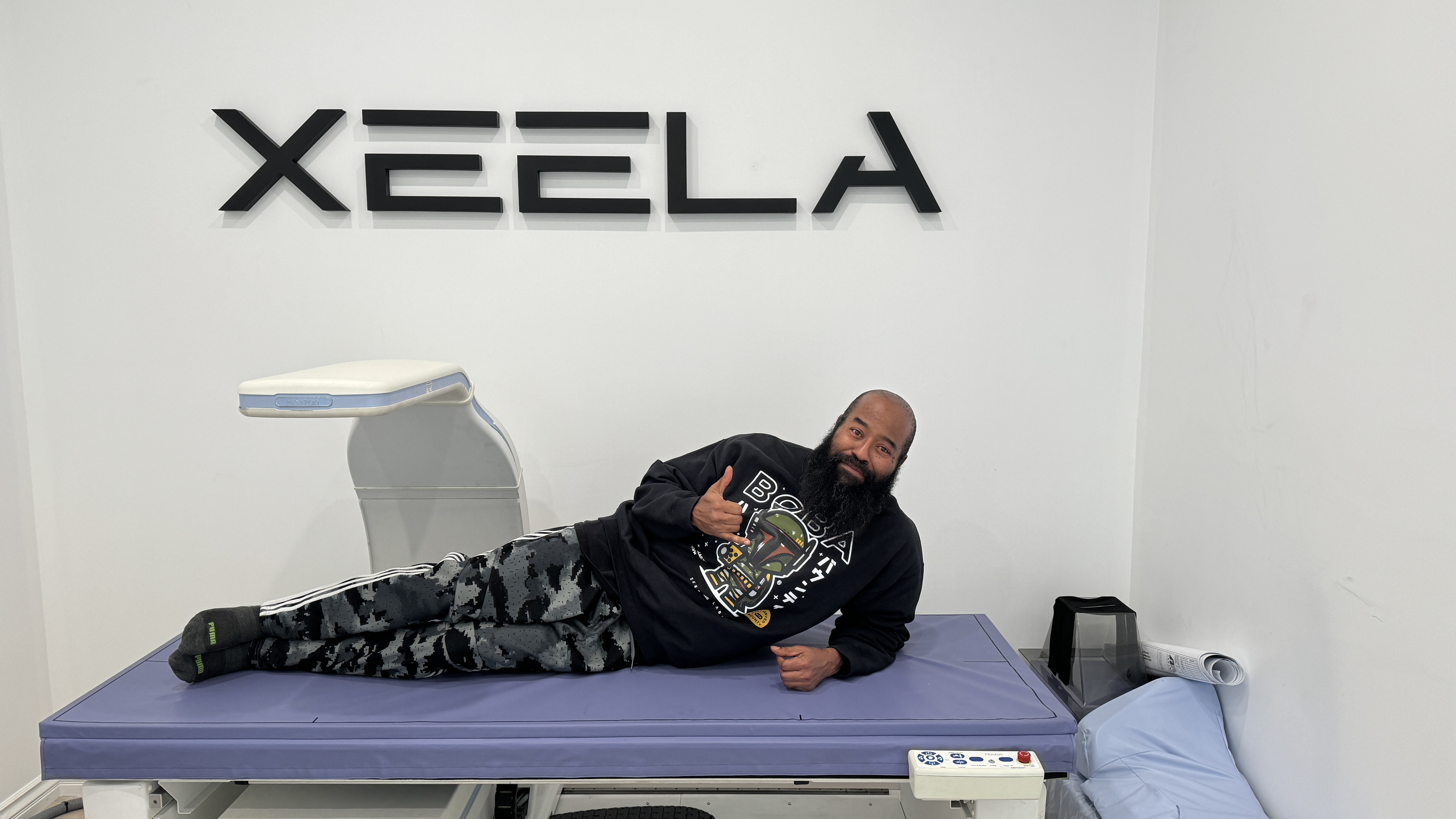 Tshaka lying on DEXA scanner