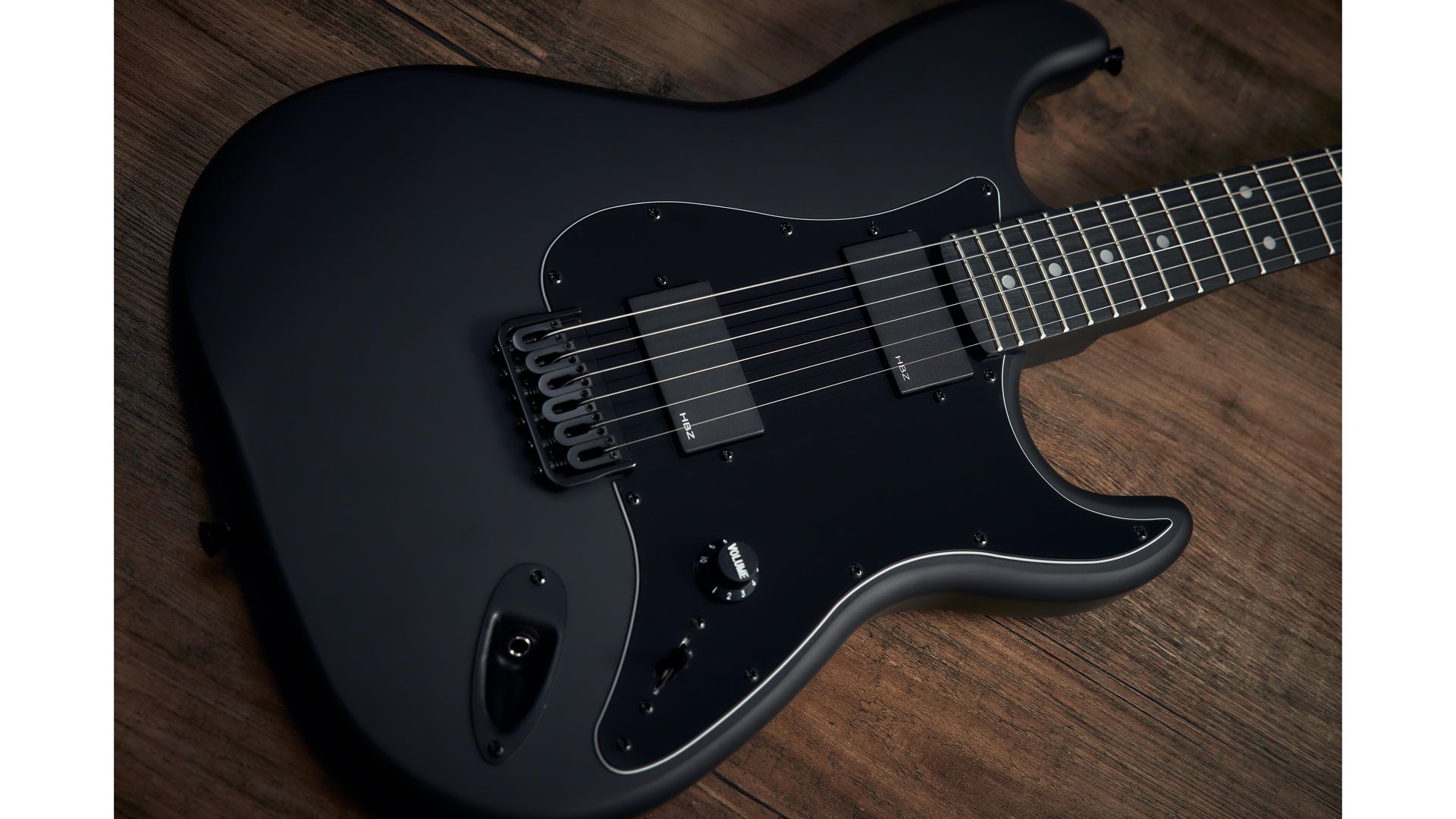 Harley Benton brings the satin black back with the £107 ST20HH Active