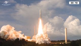 Ariane 5 soars into the midday sky with two new telecommunication satellites on board.