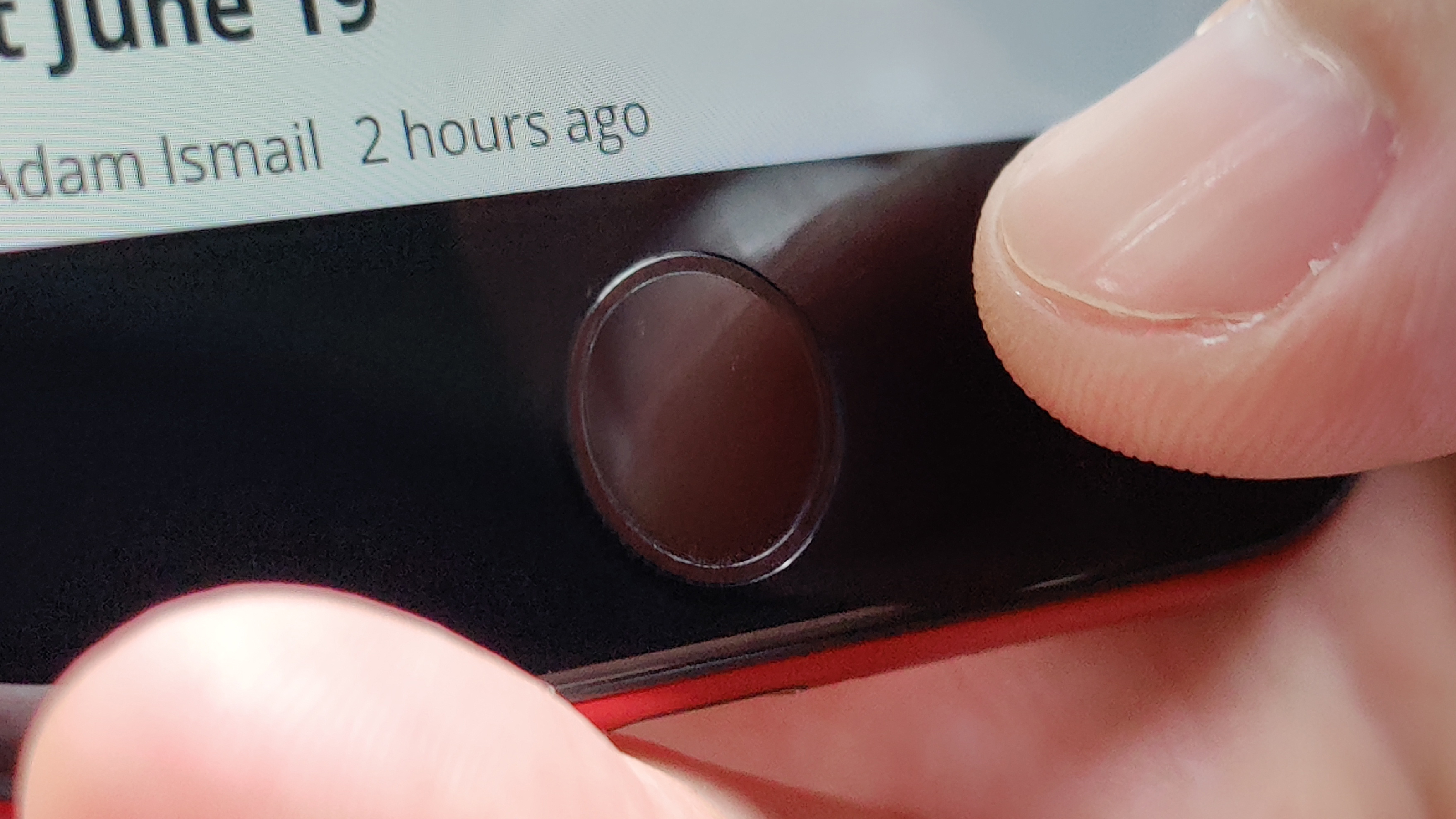 The Touch ID/Home button of the iPhone SE.