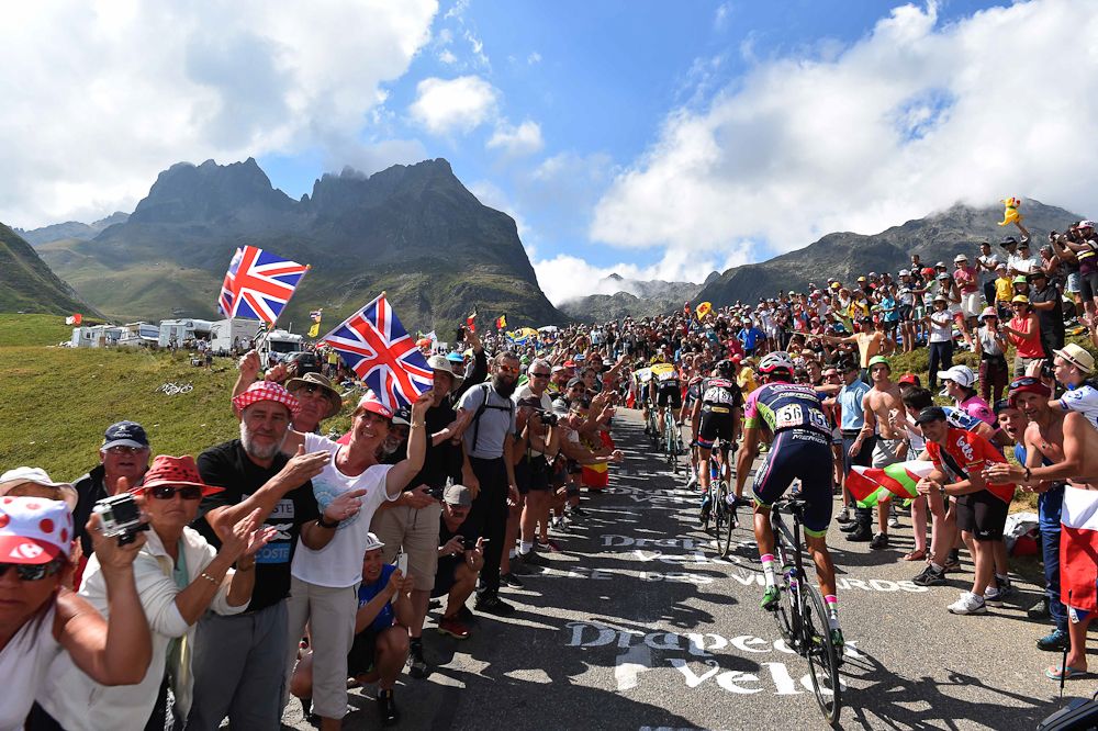 Riders make their way through the crowds.