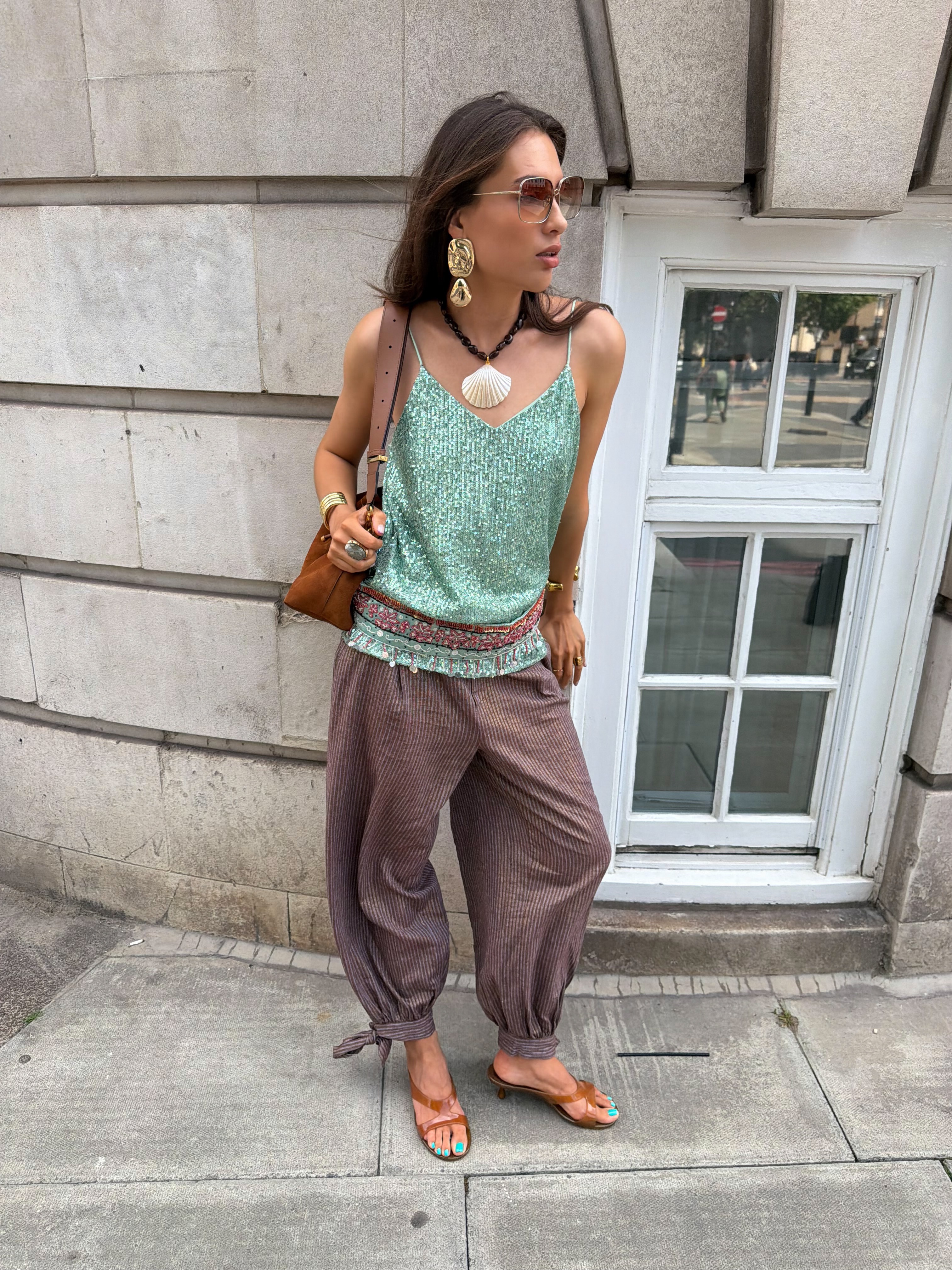 Katya wearing the Jimmy Choo Jelly Sandals
