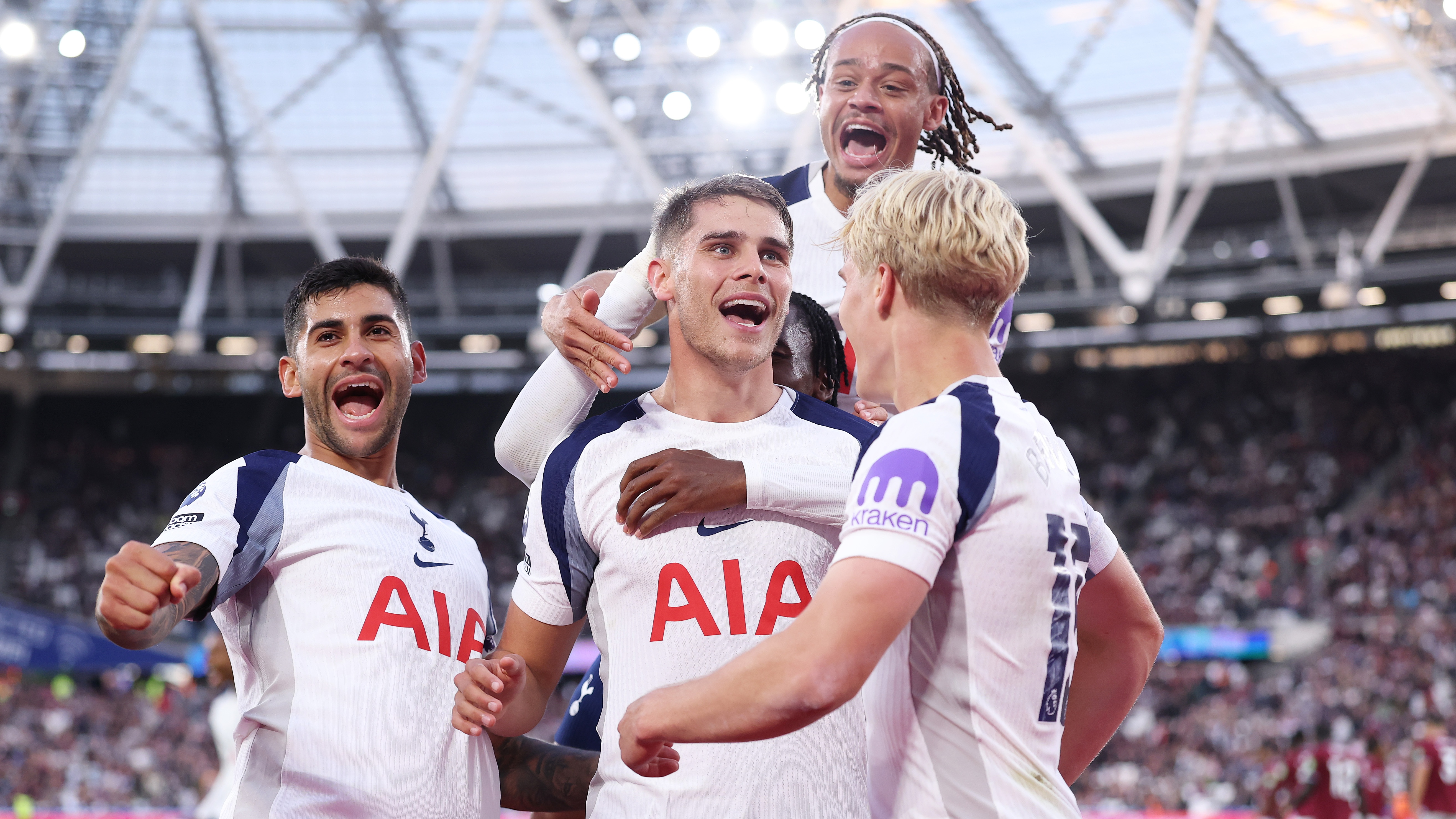 Micky van de Ven of Tottenham Hotspur celebrates scoring his team's third goal with teammates Lucas Bergvall, Xavi Simons, and Cristian Romero during the Premier League match between West Ham United and Tottenham Hotspur at London Stadium on September 13, 2025 in London, England.