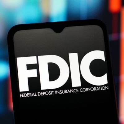 In this photo illustration, the FDIC (Federal Deposit Insurance Corporation) logo is seen displayed on a smartphone screen.