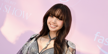 LISA attends the Victoria&#039;s Secret Fashion Show 2024 at Duggal Greenhouse on October 15, 2024 in Brooklyn, New York wearing a silver bra and black embellished cape