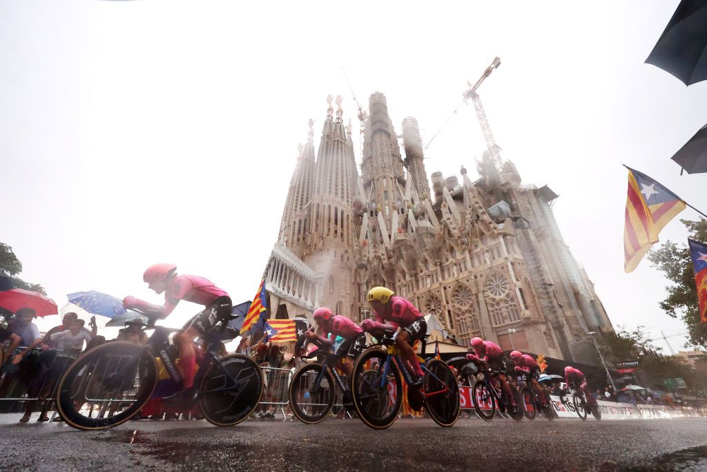 BARCELONA SPAIN AUGUST 26 Hugh Carthy of The United Kingdom Stefan Bissegger of Switzerland Diego Andres Camargo Pineda of Colombia Jonathan Klever Caicedo of Ecuador Andrea Piccolo of Italy Sean Quinn of The United States Julius Van Den Berg of The Netherlands Marijn Van Den Berg of The Netherlands and Team EF EducationEasyPost sprint in front of the Baslica de la Sagrada Famlia during the 78th Tour of Spain 2023 Stage 1 a 148km team time trial stage from Barcelona to Barcelona UCIWT on August 26 2023 in Barcelona Spain Photo by Alexander HassensteinGetty Images