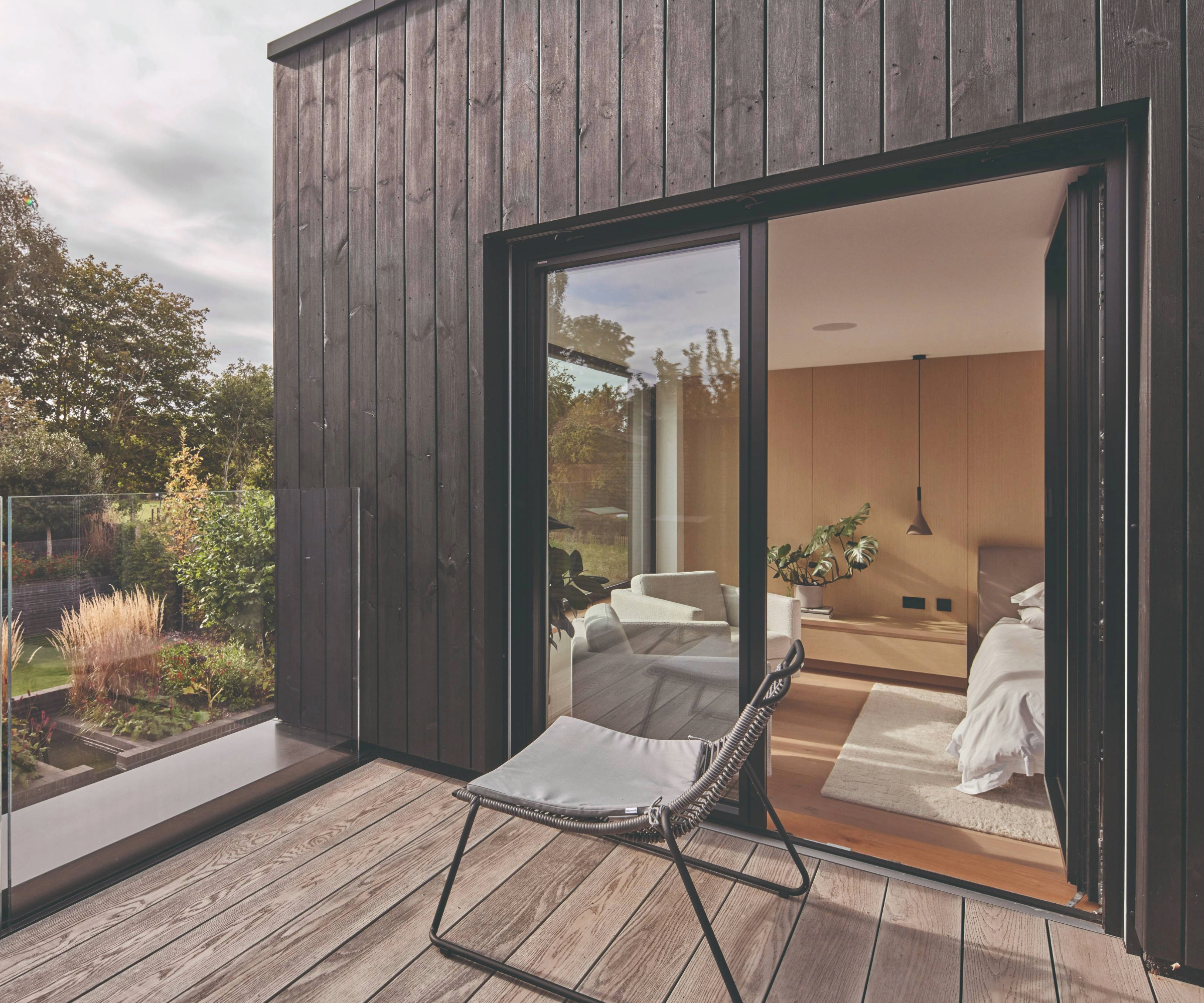 Terrace with glass balcony, attached onto a bedroom