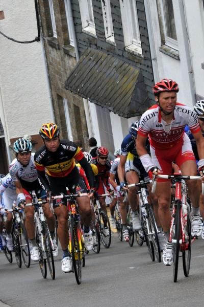 Nico Sijmens leads Stijn Devolder up the brutally tough slope.