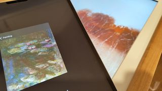 Viewunite Textura Digital Canvas review; art work on an iPad screen, held in front of a digital picture frame