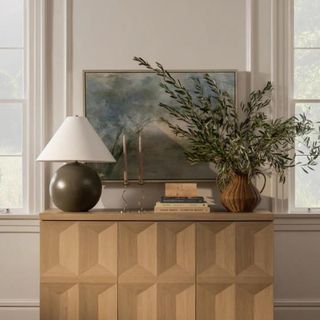 A console table with a vase from McGee & Co.